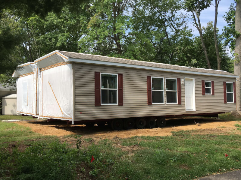 manufactured homes own the land