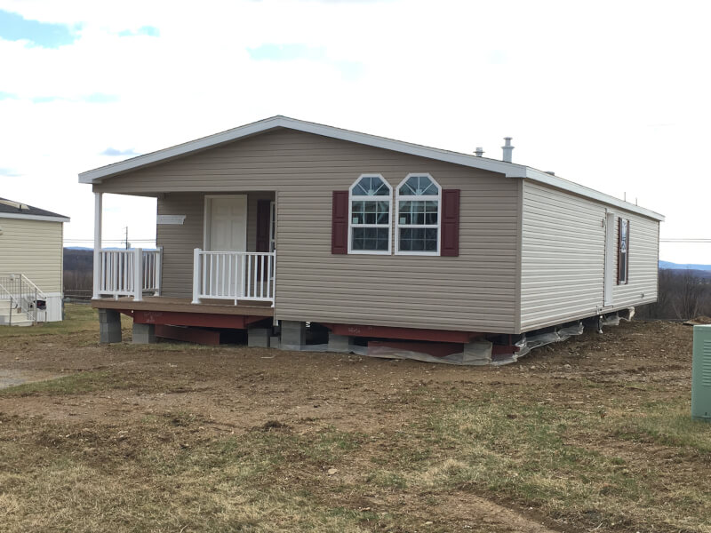 manufactured homes own the land
